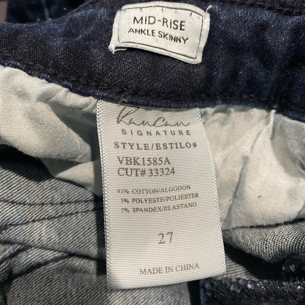 Dark denim, mid distressing